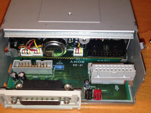 Apple 3.5 Drive External Floppy Drive Teardown, Disconnecting the Internal Floppy Cable: crwdns2935265:07crwdnd2935265:02crwdnd2935265:02crwdne2935265:0
