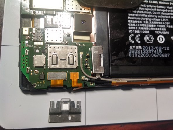 Nokia Lumia 1520 Teardown, Slide Away Metal Strap: crwdns2935265:07crwdnd2935265:02crwdnd2935265:02crwdne2935265:0