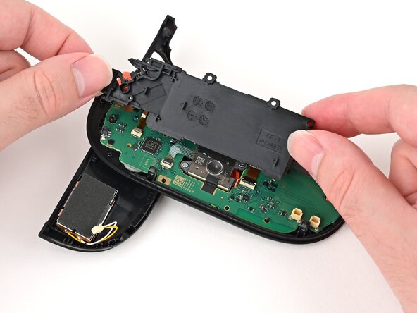 Joy-Con 2 (Right) Joystick Replacement, Reposition the midframe: crwdns2935265:018crwdnd2935265:02crwdnd2935265:03crwdne2935265:0
