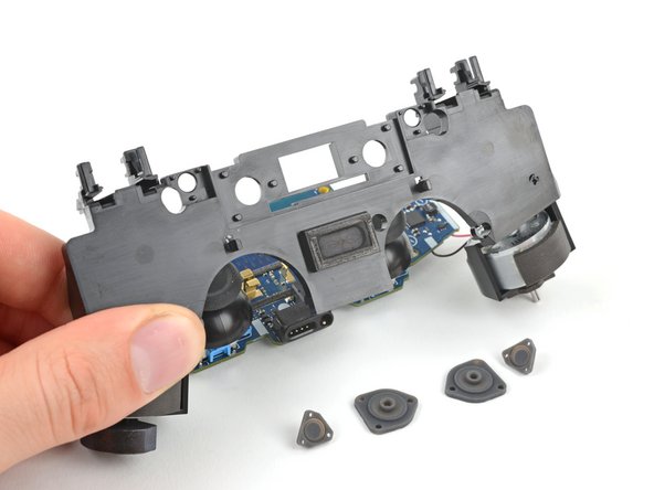 DualShock 4 Touch Pad, Start, and Options Button Pads Replacement, Remove the button pads: crwdns2935265:021crwdnd2935265:03crwdnd2935265:03crwdne2935265:0