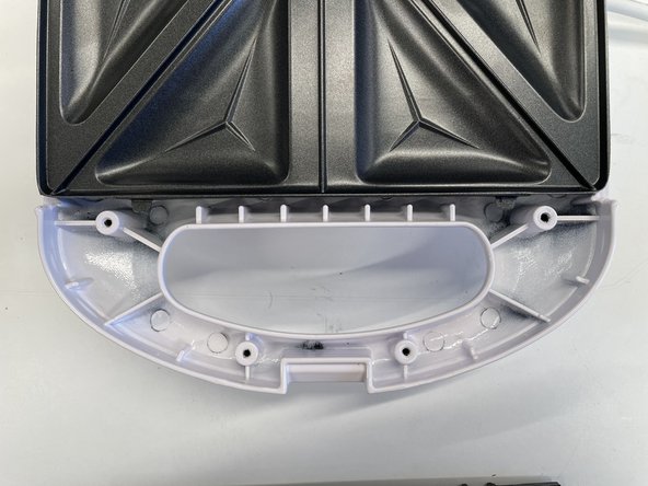 Anko 2 Sandwich Jaffle Maker Teardown, Removal of Base Internal Handle Plate: crwdns2935265:03crwdnd2935265:02crwdnd2935265:02crwdne2935265:0