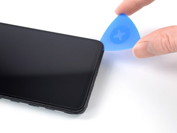 Xiaomi Redmi Note 10S Screen Replacement, Slice the adhesive: crwdns2935265:031crwdnd2935265:03crwdnd2935265:03crwdne2935265:0