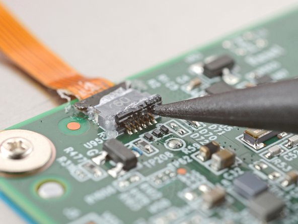 Kobo Clara BW (P365) Motherboard Replacement, Disconnect the power button ZIF connector: crwdns2935265:09crwdnd2935265:02crwdnd2935265:03crwdne2935265:0