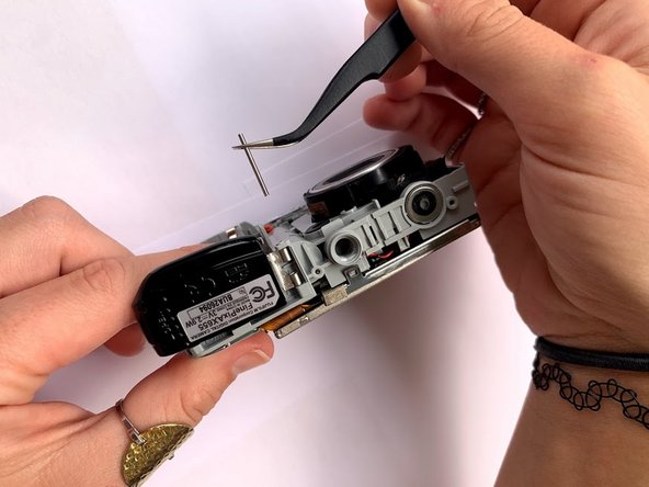 Fujifilm FinePix AX665 Battery Door Hinge Replacement: crwdns2935265:03crwdnd2935265:03crwdnd2935265:03crwdne2935265:0