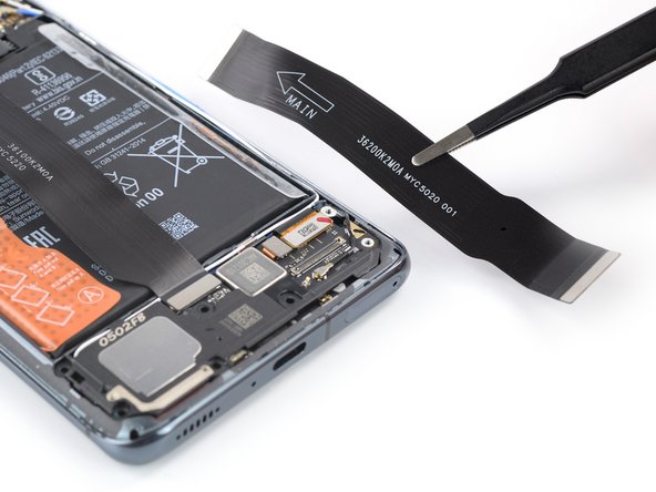 Mi 11 Screen Replacement, Remove the right interconnect cable: crwdns2935265:018crwdnd2935265:03crwdnd2935265:03crwdne2935265:0