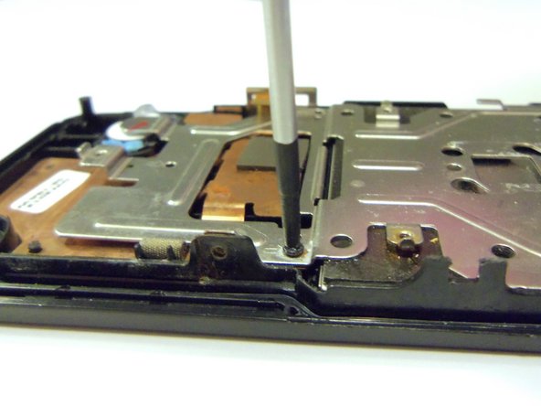 Samsung HMX-W300 LCD Screen Replacement, Remove screws.: crwdns2935265:011crwdnd2935265:02crwdnd2935265:03crwdne2935265:0