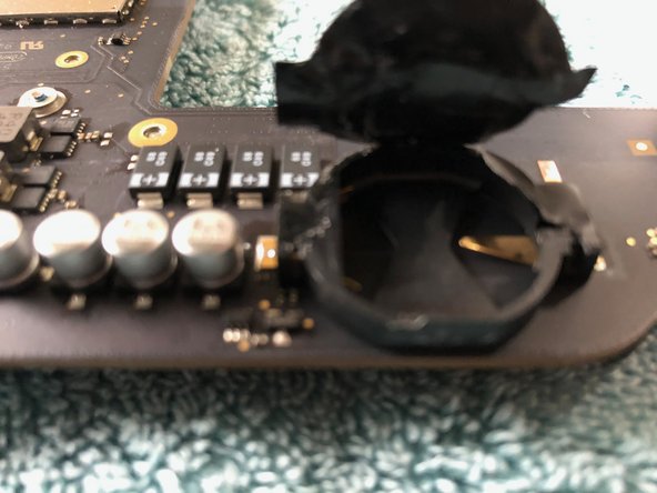 Mac Mini Late 2014 NVRAM (PRAM) Battery Replacement, Remove old battery: crwdns2935265:014crwdnd2935265:02crwdnd2935265:02crwdne2935265:0