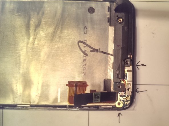 HTC One Display Assembly Replacement, Removal of Small Logic Board: crwdns2935265:017crwdnd2935265:02crwdnd2935265:03crwdne2935265:0