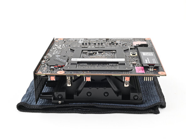 How to Install a Framework Desktop Mainboard Into a Mini‑ITX Case, Place the Mainboard: step 1, image 2 of 2