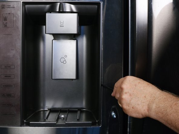 LG Refrigerator Water Dispensing Switch Testing and Replacement, Reposition the dispenser: crwdns2935265:06crwdnd2935265:03crwdnd2935265:03crwdne2935265:0