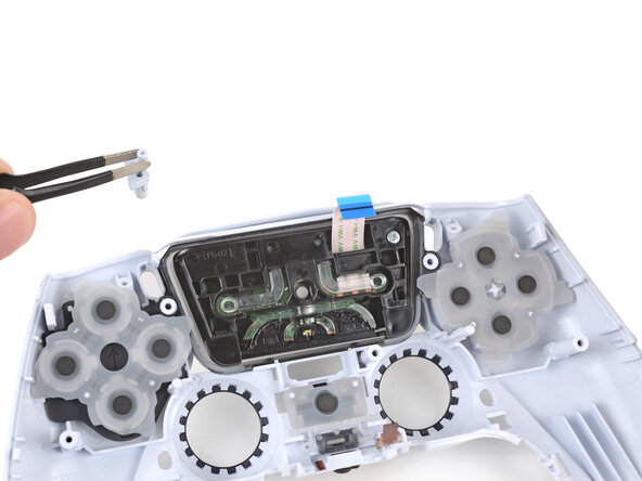 DualSense Controller V5 Touchpad Replacement, Remove the Options and Create buttons: crwdns2935265:032crwdnd2935265:03crwdnd2935265:03crwdne2935265:0