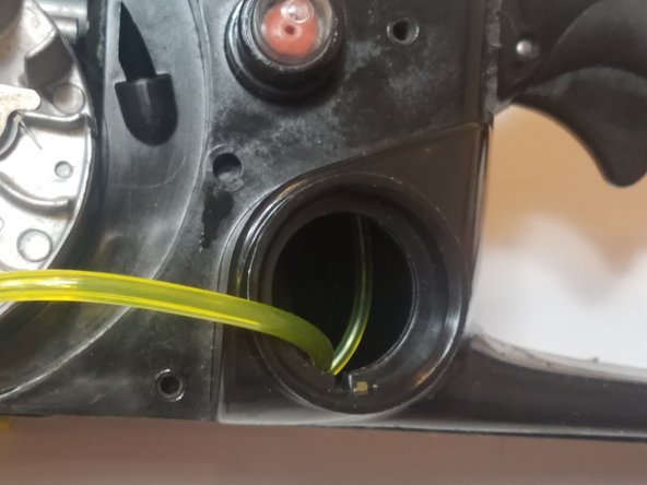 The fuel return line should be at the bottom of the tank