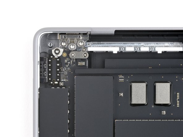 MacBook Pro 14" Late 2023 (M3) USB-C Ports Replacement, Unfasten the Touch ID connector cover: crwdns2935265:032crwdnd2935265:02crwdnd2935265:02crwdne2935265:0