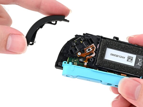 Joy-Con 2 (Left) Joystick Replacement, Install the bumper: crwdns2935265:043crwdnd2935265:01crwdnd2935265:03crwdne2935265:0