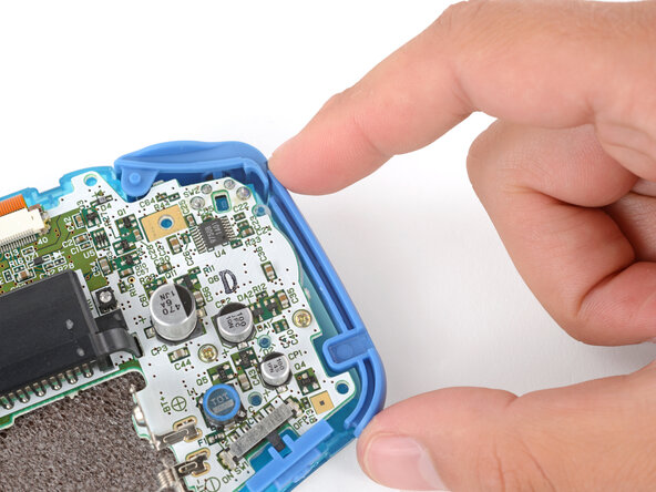 How to Reshell Your Game Boy Advance, Install the side bumpers: crwdns2935265:032crwdnd2935265:02crwdnd2935265:03crwdne2935265:0