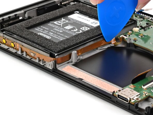 Nintendo Switch 2 Button Board Replacement, Route the button board cable: crwdns2935265:041crwdnd2935265:03crwdnd2935265:03crwdne2935265:0