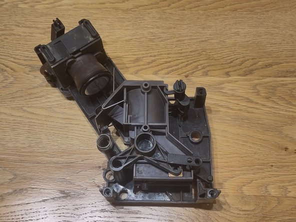 Dismantling the Melitta Caffeo CI brew group in the appliance, Removing the coffee chamber: crwdns2935265:08crwdnd2935265:02crwdnd2935265:02crwdne2935265:0