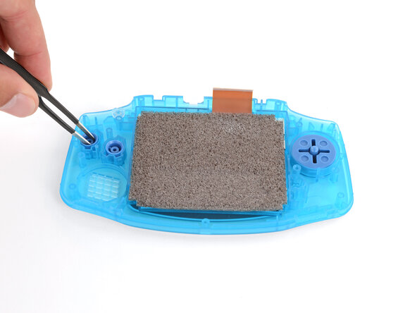 How to Reshell Your Game Boy Advance, Install the D‑pad and action buttons: crwdns2935265:024crwdnd2935265:03crwdnd2935265:03crwdne2935265:0