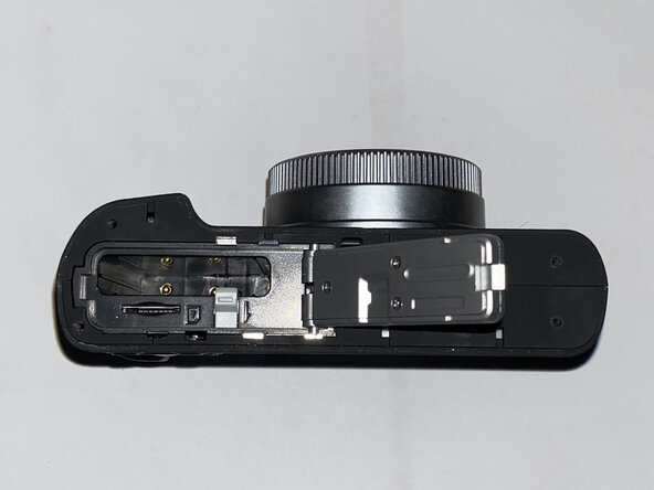 Sonida DC202 Camera Teardown, Bottom Cover: crwdns2935265:03crwdnd2935265:02crwdnd2935265:03crwdne2935265:0