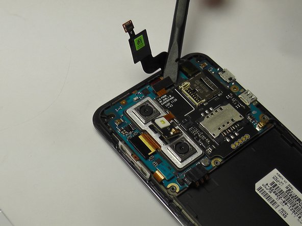 LG Thrill 4G SIM/Micro SD Card Replacement, Ribbon Cable Disconnection: crwdns2935265:08crwdnd2935265:02crwdnd2935265:03crwdne2935265:0