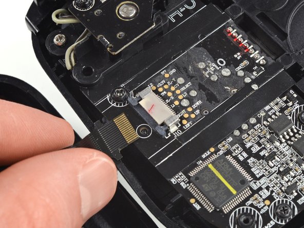 How to Open the Razer Kishi, Disconnect the interconnect cable: crwdns2935265:06crwdnd2935265:03crwdnd2935265:03crwdne2935265:0