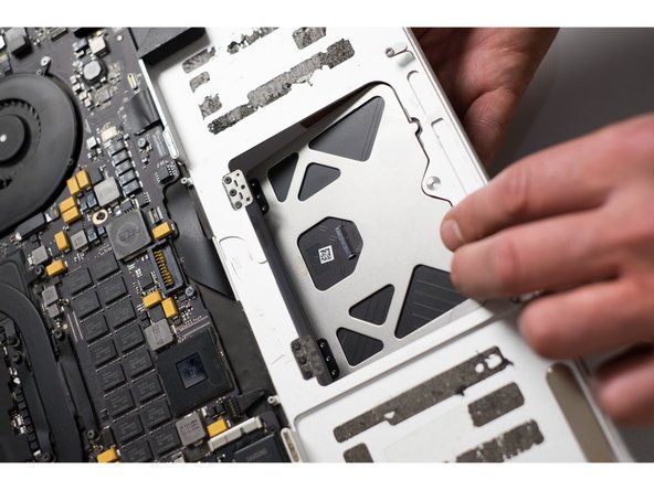 Battery and Trackpad. Disassembling MacBook Pro 15" Retina 2012-2015: crwdns2935265:010crwdnd2935265:03crwdnd2935265:03crwdne2935265:0