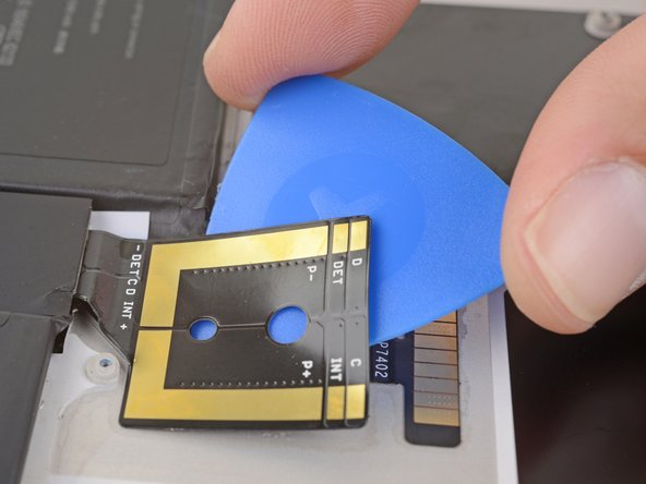 Microsoft Surface Pro 5 Battery Replacement, Separate the battery connector adhesive: crwdns2935265:051crwdnd2935265:03crwdnd2935265:03crwdne2935265:0