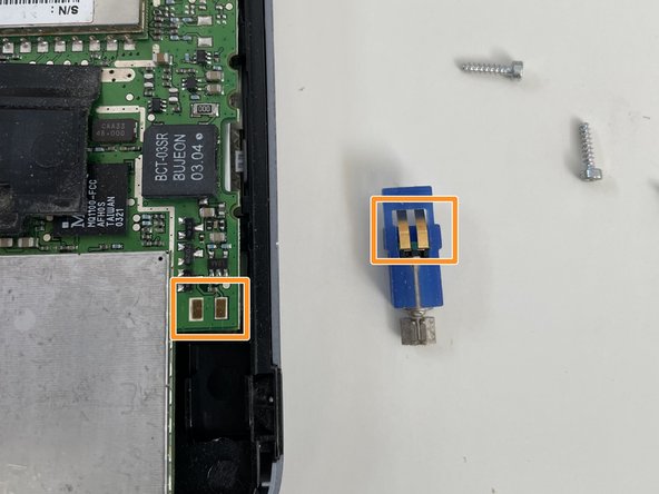 Palm Tungsten W (i710) Teardown, Remove the vibrator: crwdns2935265:06crwdnd2935265:02crwdnd2935265:02crwdne2935265:0