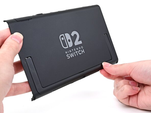 Nintendo Switch 2 Kickstand Replacement, Install the kickstand: crwdns2935265:025crwdnd2935265:03crwdnd2935265:03crwdne2935265:0