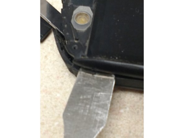 Kyocera Brigadier Teardown, Outer frame removal: step 7, image 2 of 3