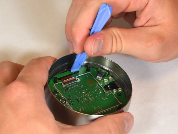 Nest Learning Thermostat 2nd Generation LCD Screen Replacement, Disconnect display from motherboard: crwdns2935265:014crwdnd2935265:02crwdnd2935265:03crwdne2935265:0