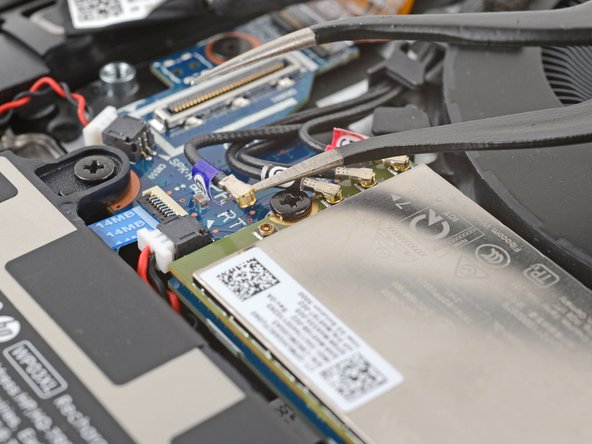 HP EliteBook 845 G9 Display Assembly Replacement, Disconnect the WWAN cables: crwdns2935265:09crwdnd2935265:02crwdnd2935265:03crwdne2935265:0