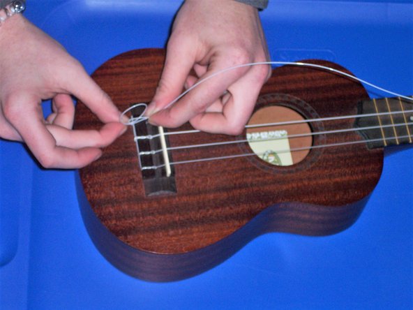 How to Change Strings on a Ukulele: crwdns2935265:05crwdnd2935265:02crwdnd2935265:02crwdne2935265:0