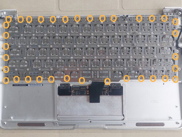 MacBook Air 11" Mid 2013 Keyboard Replacement, Remove the keyboard screws: crwdns2935265:00crwdnd2935265:01crwdnd2935265:01crwdne2935265:0