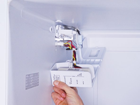 Whirlpool Refrigerator Thermistor Replacement, Reposition the assembly: crwdns2935265:04crwdnd2935265:03crwdnd2935265:03crwdne2935265:0