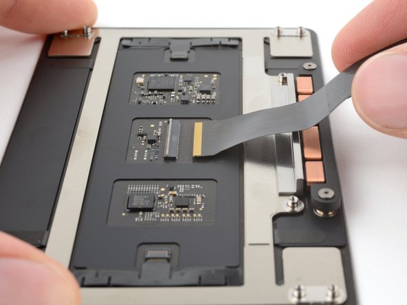 MacBook Pro 14" Late 2023 (M3) Trackpad Replacement, Remove the trackpad cable: crwdns2935265:028crwdnd2935265:02crwdnd2935265:02crwdne2935265:0