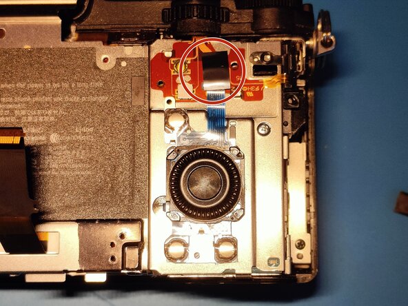 Sony A7 II Top Flex Cable replacement, Removing scroll wheel assembly 1: crwdns2935265:012crwdnd2935265:01crwdnd2935265:03crwdne2935265:0