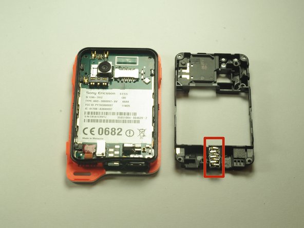 Sony Ericsson xPeria Active Screen Replacement, Removing The Motherboard Cover: crwdns2935265:05crwdnd2935265:02crwdnd2935265:02crwdne2935265:0