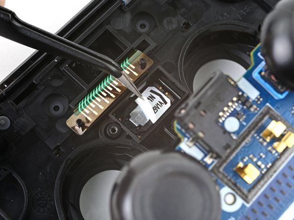 DualShock 4 (CUH-ZCT1U) Speaker Replacement, Peel up the sticker: crwdns2935265:021crwdnd2935265:02crwdnd2935265:02crwdne2935265:0