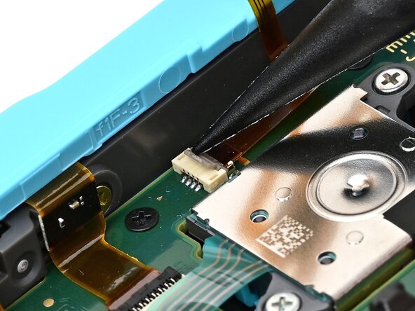 Joy-Con 2 (Left) Joystick Replacement, Disconnect the trigger board: crwdns2935265:022crwdnd2935265:03crwdnd2935265:03crwdne2935265:0