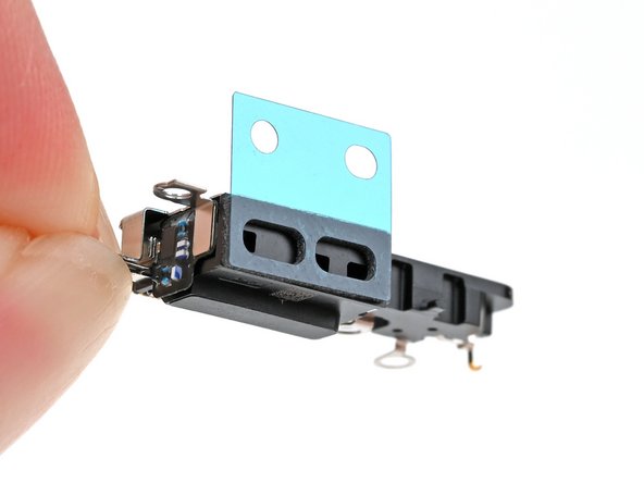 iPhone 16 Plus Microphone Replacement, Apply the adhesive: crwdns2935265:033crwdnd2935265:03crwdnd2935265:03crwdne2935265:0