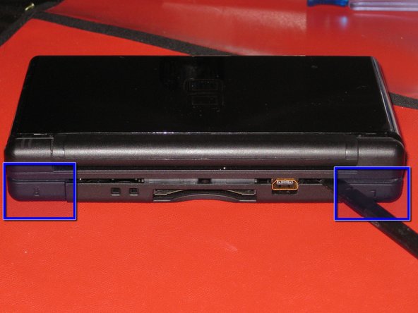 Use a spudger to pry open the gap between the bottom case and the front panel.  Work all the way around the case until the panel is free.
