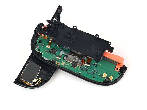 Joy-Con 2 (Right) Joystick Replacement, Reposition the midframe: crwdns2935265:018crwdnd2935265:03crwdnd2935265:03crwdne2935265:0