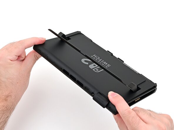 Nintendo Switch 2 Microphone Replacement, Install the back cover: crwdns2935265:052crwdnd2935265:03crwdnd2935265:03crwdne2935265:0