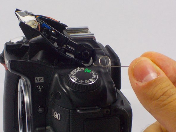 Nikon D90 Flash Hinge Spring Replacement, Removing the Spring: crwdns2935265:06crwdnd2935265:02crwdnd2935265:02crwdne2935265:0