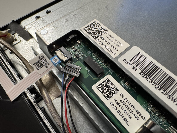 Dell Inspiron 20 3043 CMOS Battery Replacement, Remove the speaker cable and power status light cable: step 10, image 2 of 3
