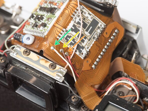 Pentax Super Program Front Lens Board Removal, Unsolder flash sync and shutter wires: crwdns2935265:013crwdnd2935265:02crwdnd2935265:02crwdne2935265:0