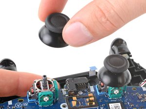 Comment réparer le drift des boutons analogique d'une manette PS4 (R3 ou L3  ne fonctionne pas) - Tutoriel de réparation iFixit