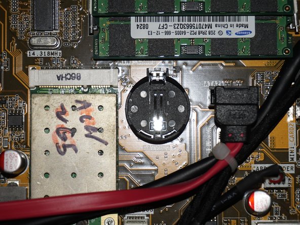 HP Touchsmart IQ506 CMOS Battery Replacement, Remove the battery: step 11, image 3 of 3