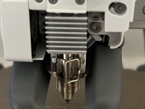 Bambu A1 Mini Hotend Assembly Replacement, Take off ruber sock: шаг 3, изображение 2 из 2